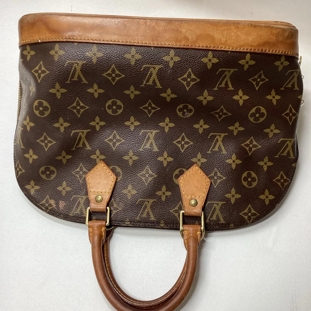 Louis Vuitton Monogram Alma Handbag Brown Coated Canvas Leather